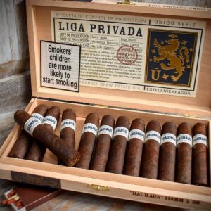 Liga Privada Unico Serie premium Nicaraguan cigars in dark wooden box.
