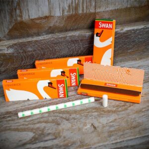 Bulk box of Swan Liquorice flavored rolling papers for wholesale distribution.
